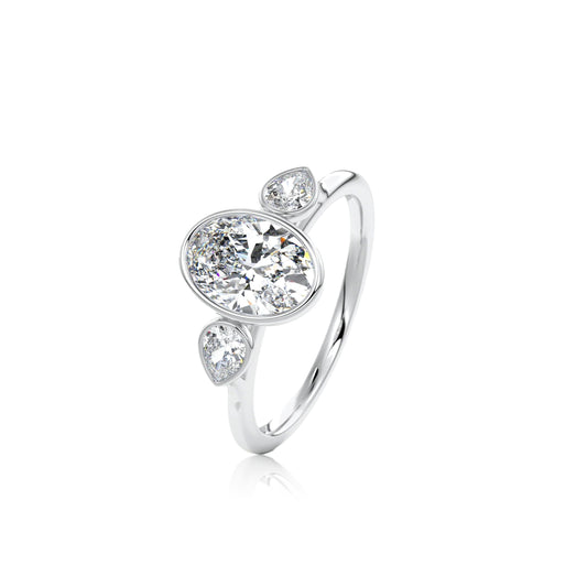 Oval Cut 3 Stone Diamond Bezel Set Ring